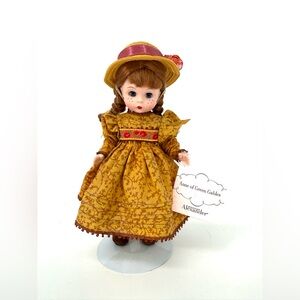 Madame Alexander Doll in Golden Dress with Red Accents